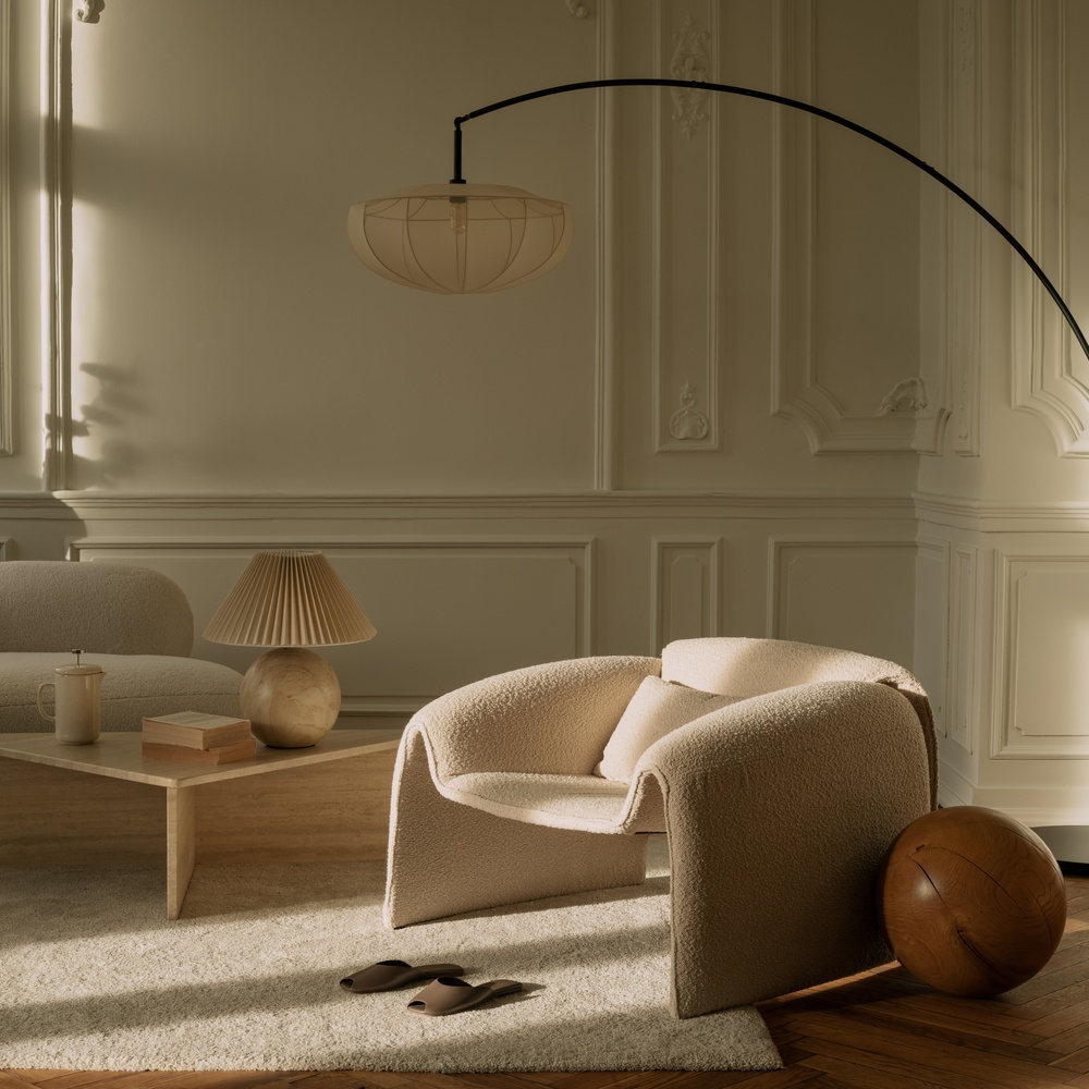 Quiet luxury living room with neutral tones and elegant furnishings. 
